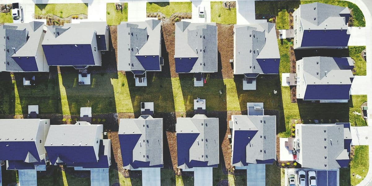 Aerial view of a neighborhood showcasing various houses, highlighting community and connection in urban living.