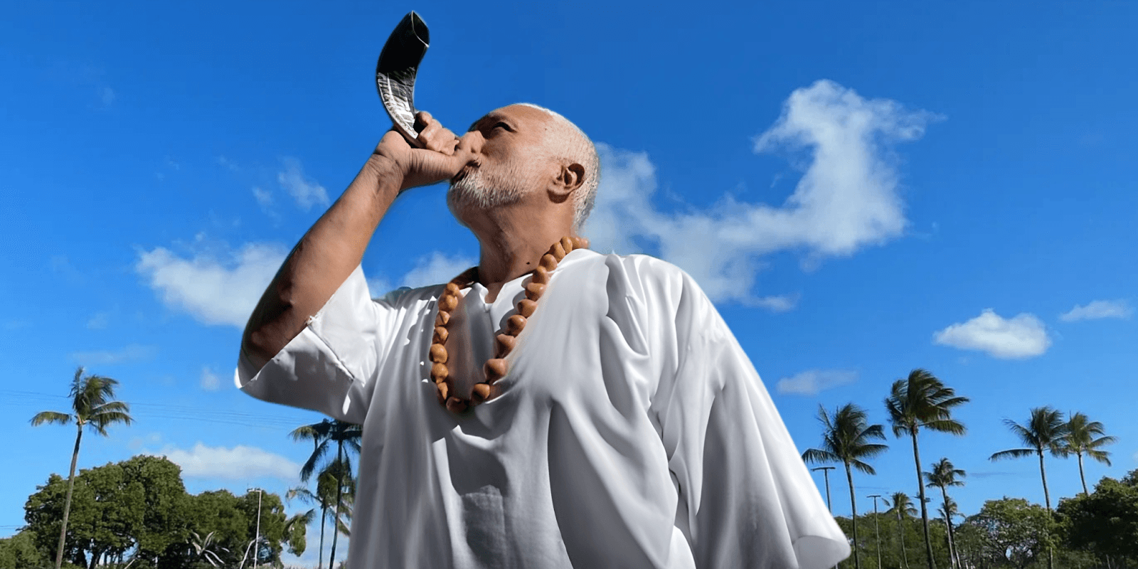 "Apostle Constantine I. Nightingdale leading spiritual transformation, using the shofar to inspire action and leadership in his ministry."